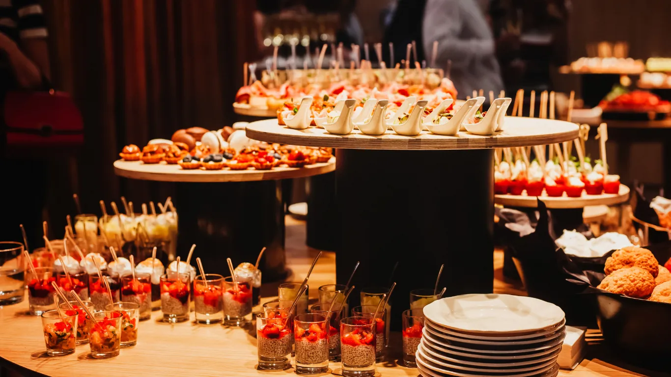 Canapés and shooters set out for a corporate reception catered by Claire's Kitchen