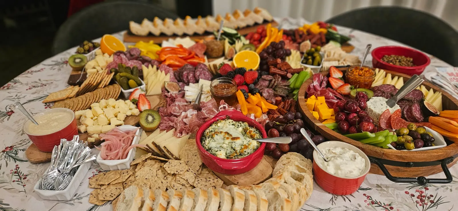 A holiday grazing table with warm dip, baguette and charcuterie for a family gathering in Oakville