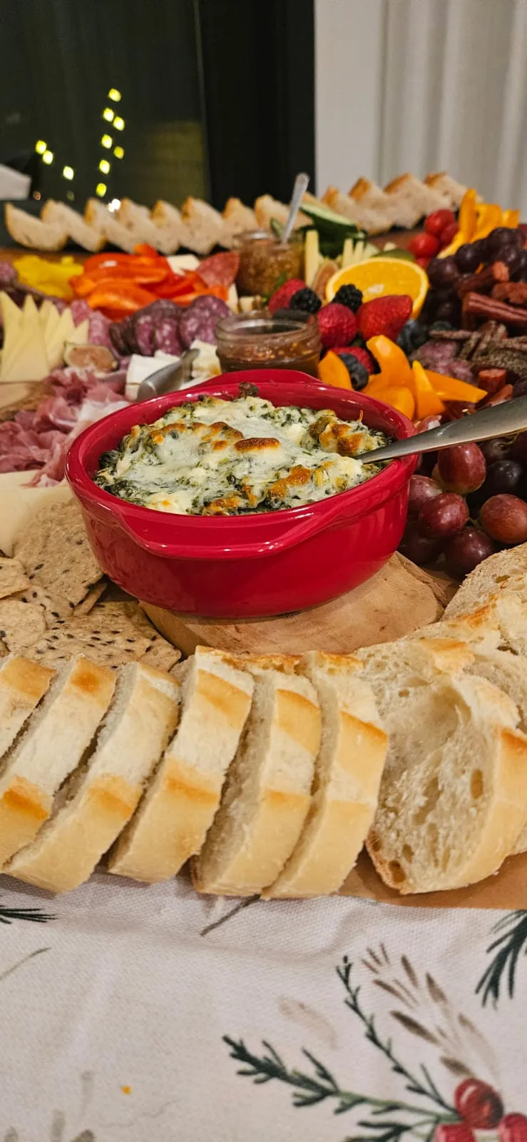 Warm spinach dip and baguette set out before a private dinner in Burlington
